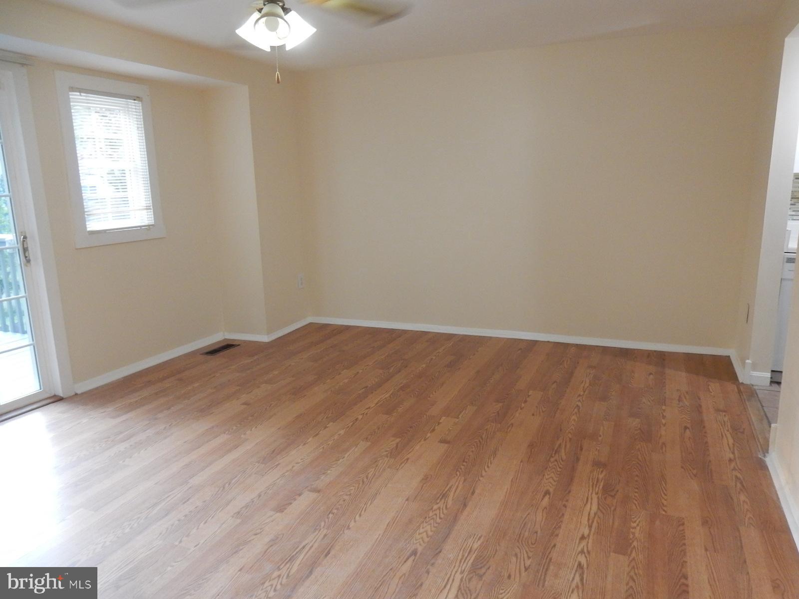 9319 Matador Road Columbia, MD 21045 - Photo 4 of 21 Dining/Living Room. Notice laminated floors! Easy!