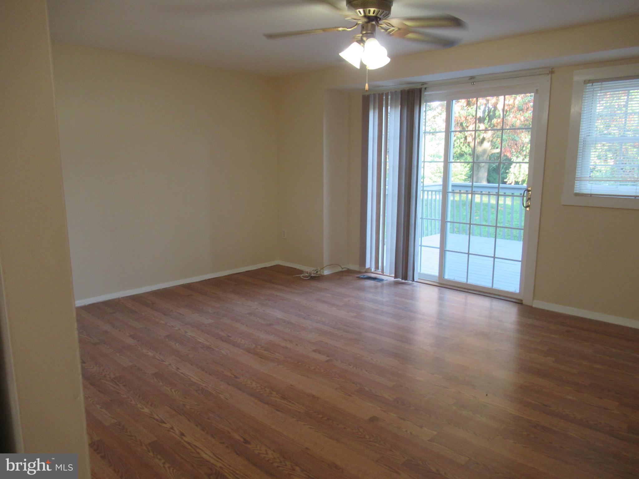 9319 Matador Road Columbia, MD 21045 - Photo 5 of 21 Living Rm Area with Walk-Out to Deck