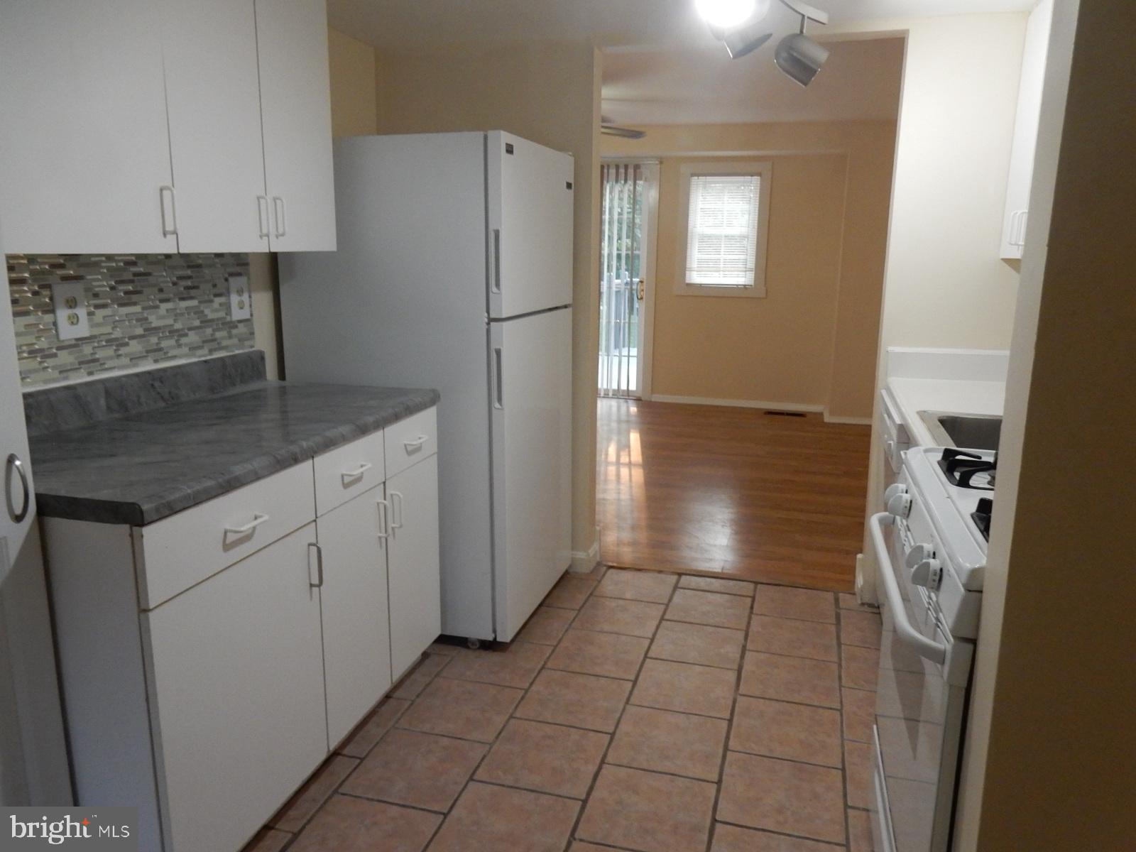 9319 Matador Road Columbia, MD 21045 - Photo 7 of 21 View of Galley Kitchen with cabinets on one Side &