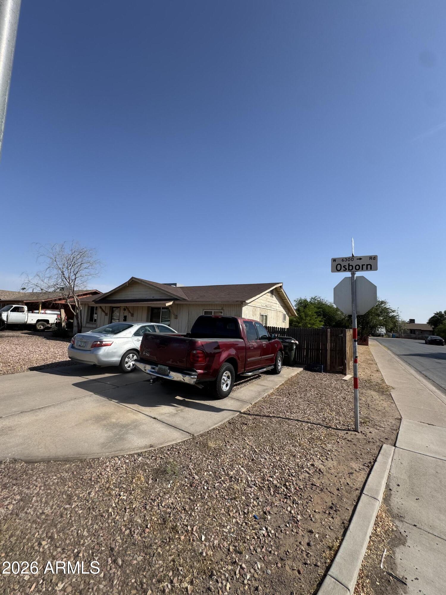 6313 West Osborn Road Phoenix, AZ 85033 - Photo 10 of 12 a view of a car park in front of house