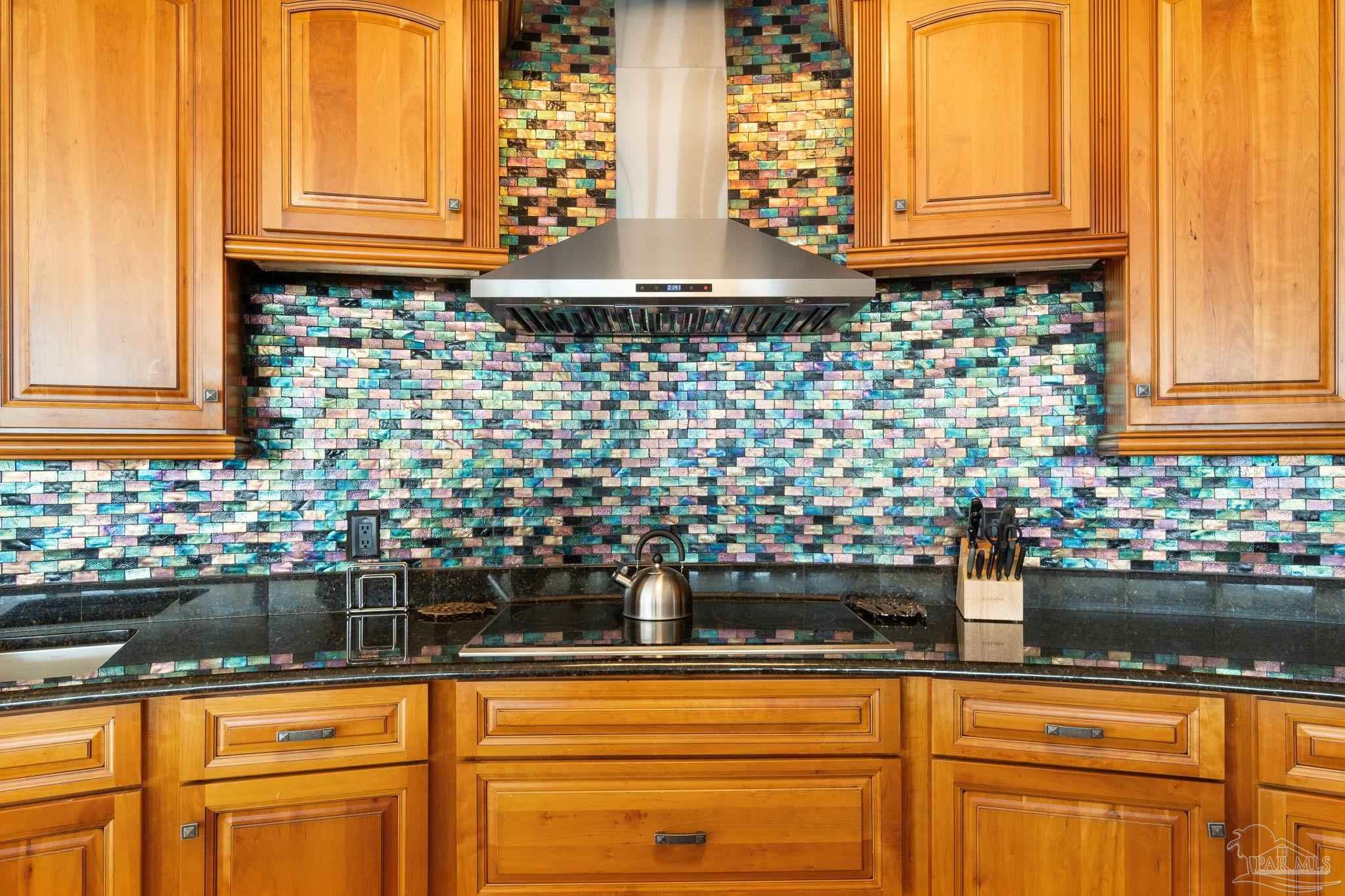 16551 Perdido Key Drive, Unit 202 Perdido Key, FL 32507 - Photo 17 of 54 a kitchen with a sink and a microwave