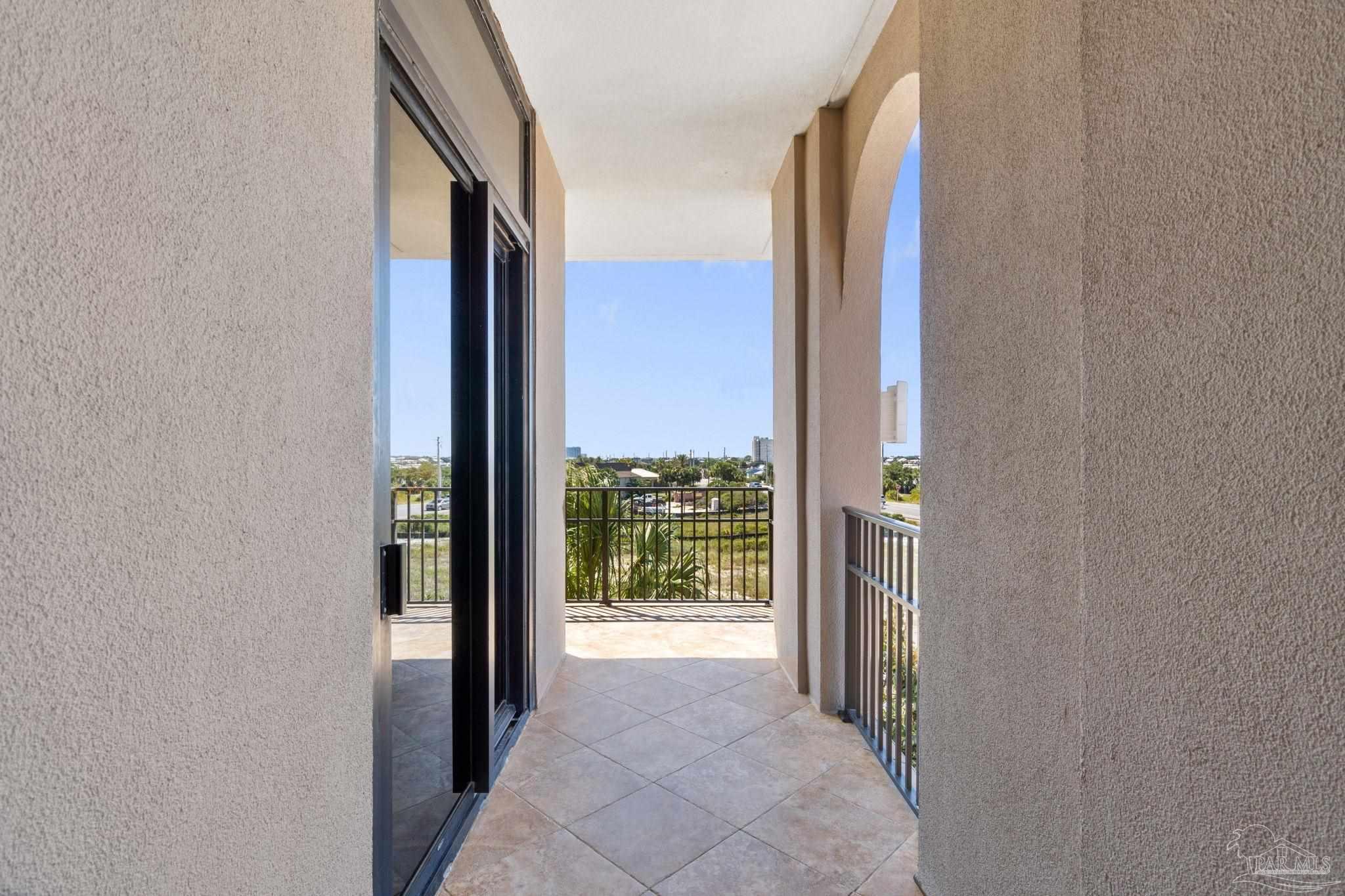16551 Perdido Key Drive, Unit 202 Perdido Key, FL 32507 - Photo 40 of 54 a view of entryway with a floor to ceiling window