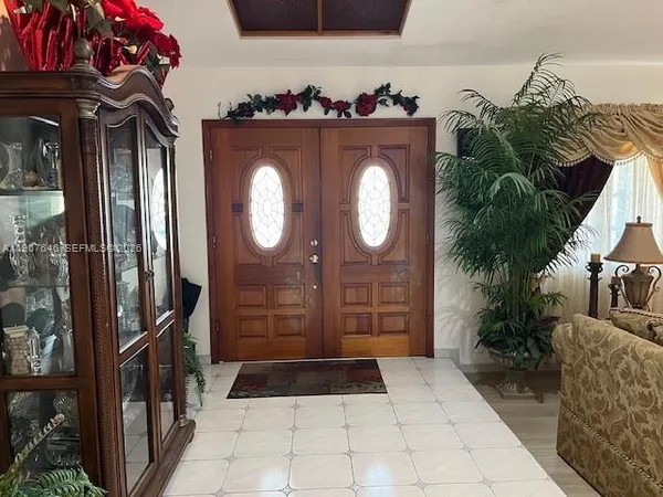 a living room with furniture and a couch