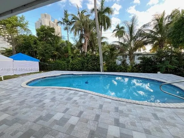 a view of outdoor space yard and swimming pool