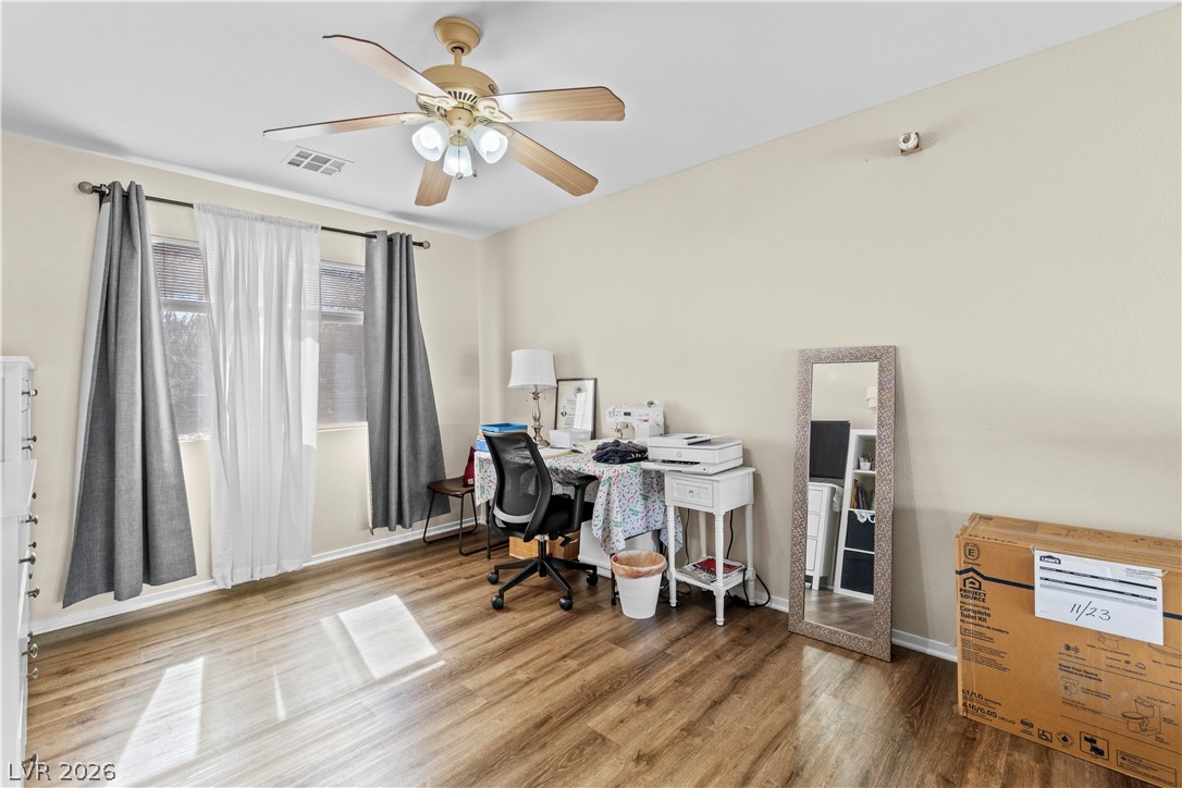 1419 Red Sunset Avenue Henderson, NV 89074 - Photo 18 of 35 Office featuring wood finished floors and a ceiling fan