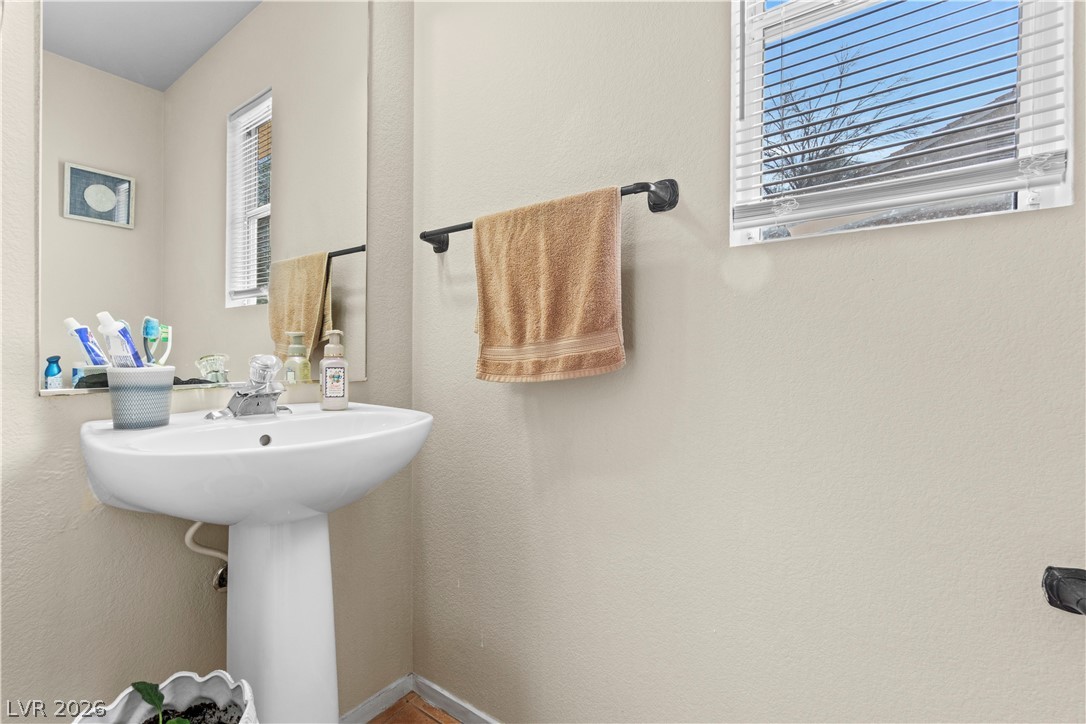 1419 Red Sunset Avenue Henderson, NV 89074 - Photo 23 of 35 Bathroom featuring baseboards