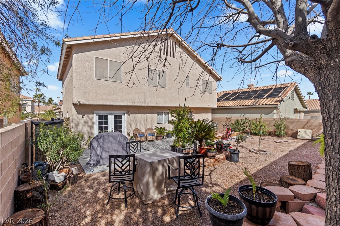 1419 Red Sunset Avenue Henderson, NV 89074 - Photo 33 of 35 Fenced backyard with a patio area and area for grilling