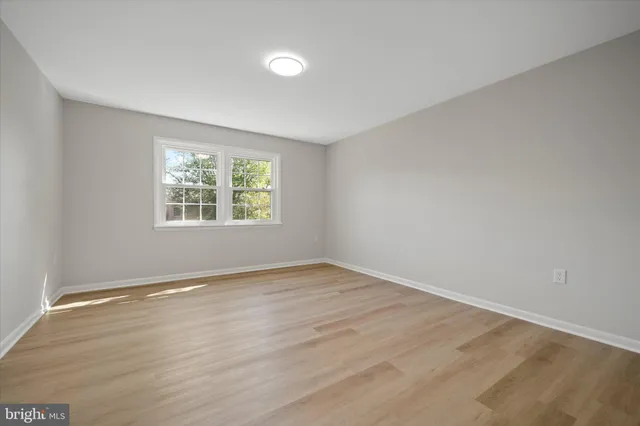 a view of balcony with wooden floor