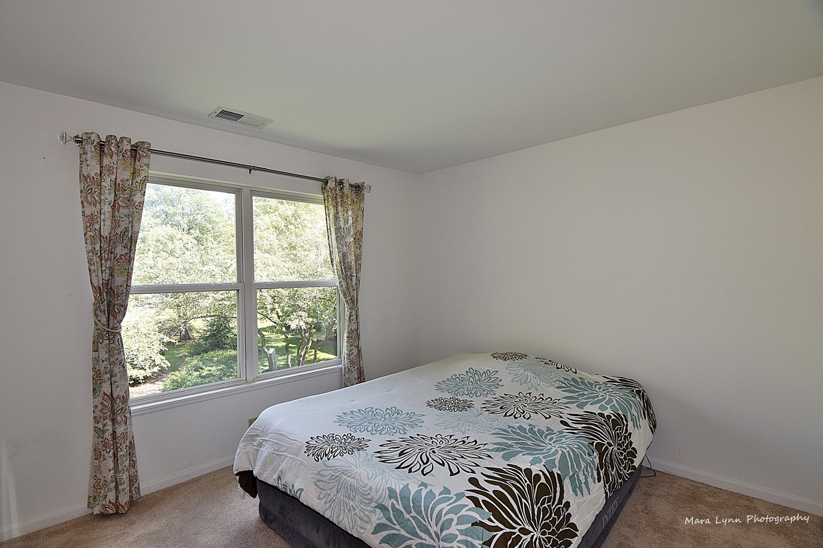 625 Cobblestone Court Elgin, IL 60120 - Photo 11 of 15 a bedroom with a bed and a window