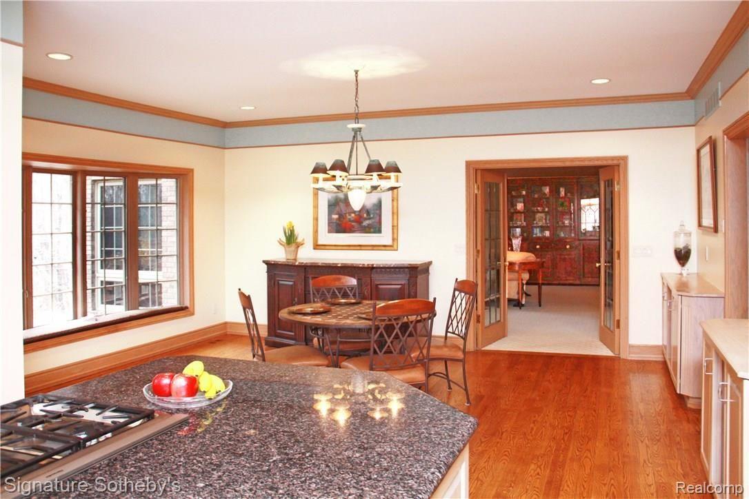 8400 Ridge Road Canton, MI 48187 - Photo 8 of 69 Beautiful Wood Flooring to accent Breakfast Nook and Bay Window