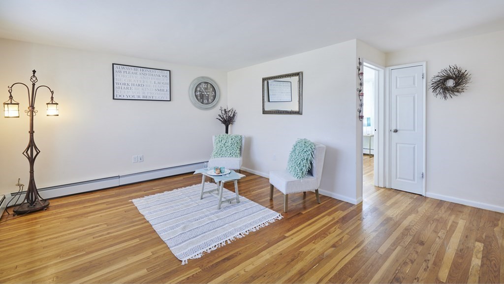 20 Carson Road Woburn, MA 01801 - Photo 16 of 38 a bed room with a bed and a table