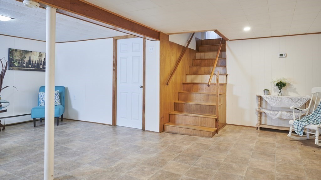 20 Carson Road Woburn, MA 01801 - Photo 28 of 38 a view of an empty room with a window