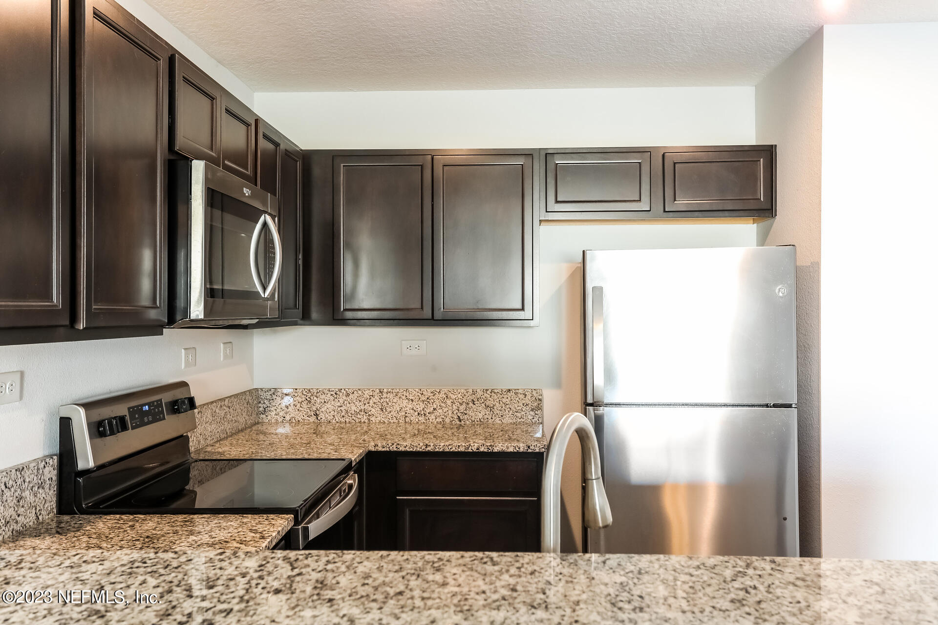 8277 Rigel Road Jacksonville, FL 32216 - Photo 5 of 15 021-photo-kitchen-12384306