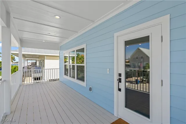 a view of a porch and wooden floor
