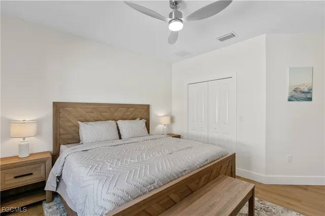 a bathroom with a double vanity sink mirror and shower