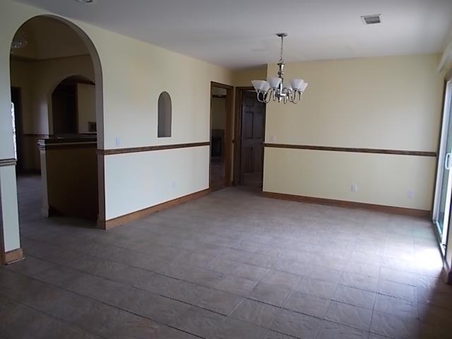 7621 South Harpeth Road Primm Springs, TN 38476 - Photo 8 of 20 a view of a kitchen with a ceiling fan