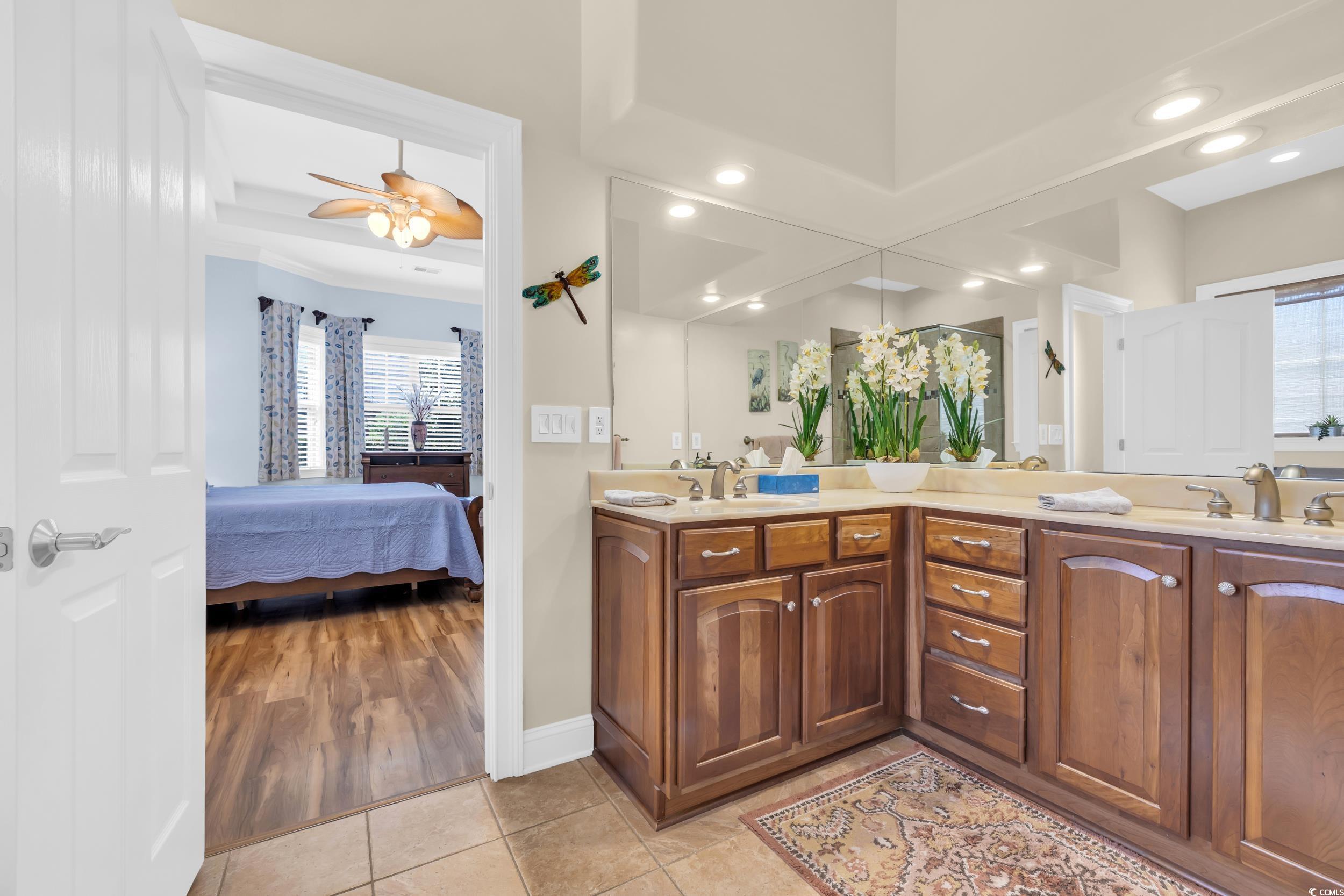 4254 Congressional Drive Myrtle Beach, SC 29579 - Photo 21 of 40 Full bath with double vanity, tile floors, plenty of natural light, and recessed lighting