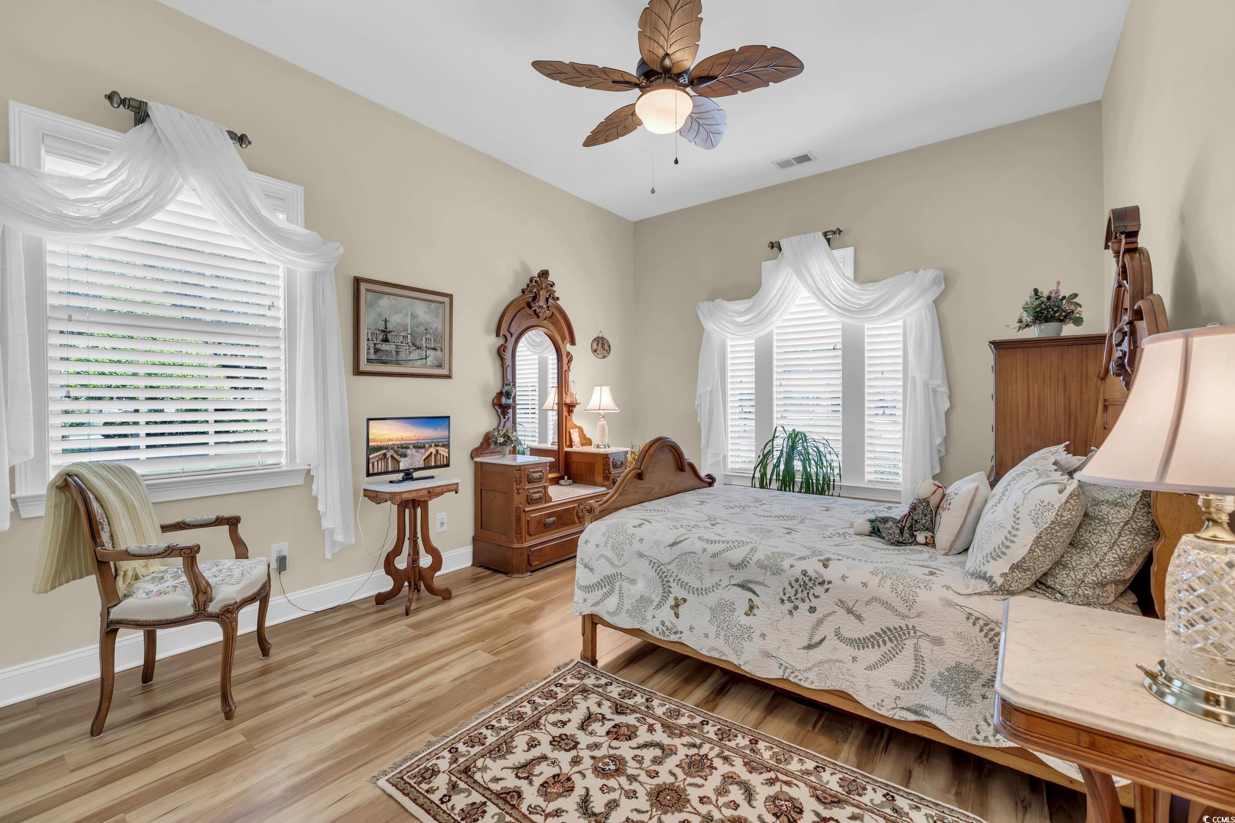 4254 Congressional Drive Myrtle Beach, SC 29579 - Photo 24 of 40 Bedroom with LVP flooring and ceiling fan