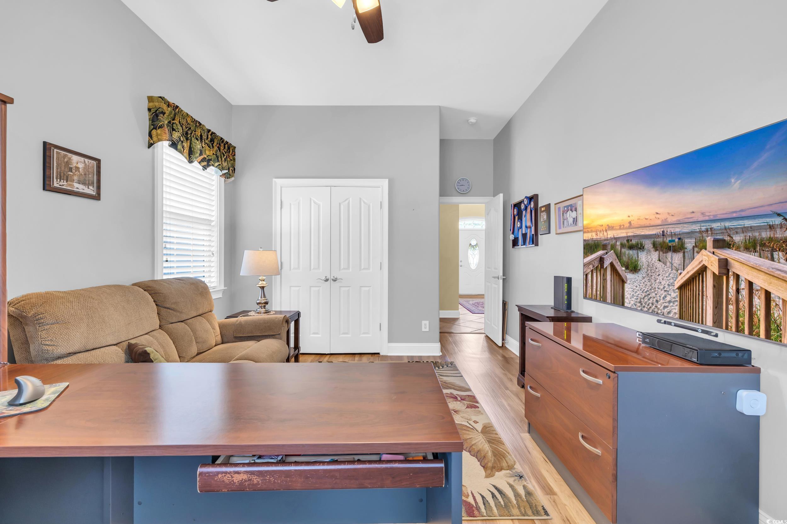 4254 Congressional Drive Myrtle Beach, SC 29579 - Photo 25 of 40 Bedroom featuring a closet, ceiling fan and LVP flooring