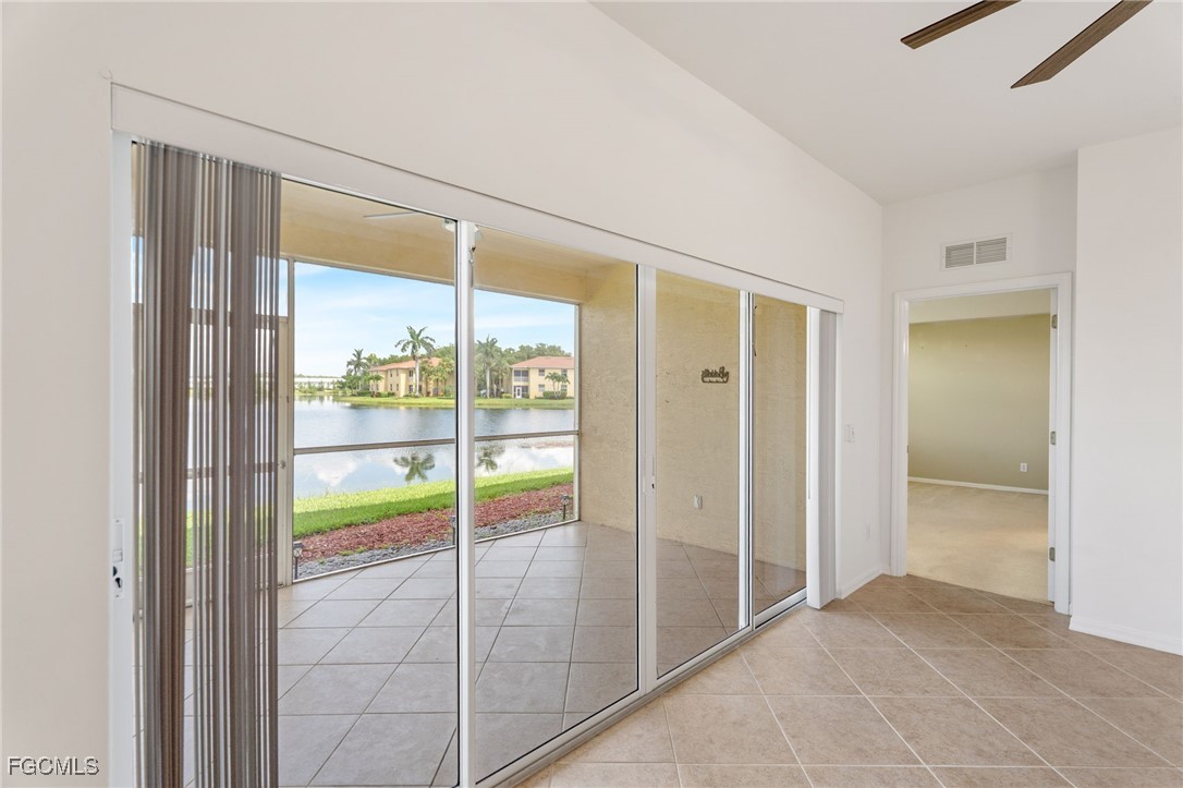 4336 Bellasol Circle, Unit 2911 Fort Myers, FL 33916 - Photo 11 of 45 a view of an empty room and window