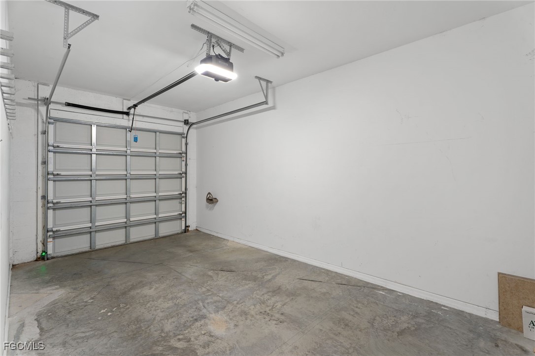 4336 Bellasol Circle, Unit 2911 Fort Myers, FL 33916 - Photo 34 of 45 a view of a garage