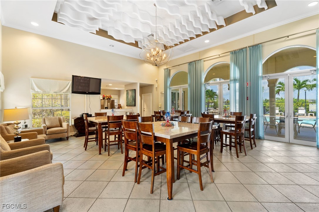 4336 Bellasol Circle, Unit 2911 Fort Myers, FL 33916 - Photo 45 of 45 a view of a dining room with furniture