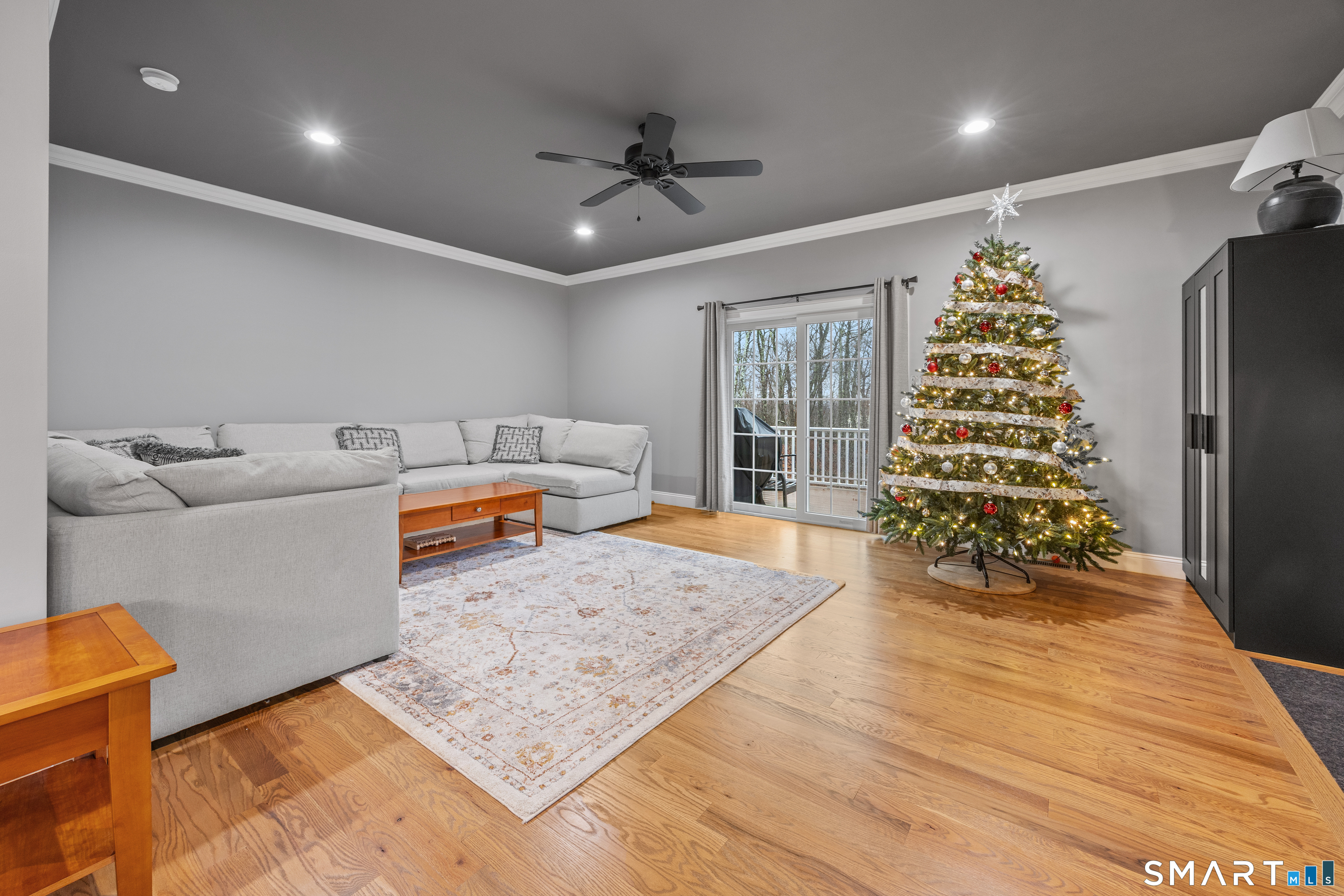 52 Brookview Circle, Unit 52 Bristol, CT 06010 - Photo 14 of 29 a living room with furniture and a chandelier