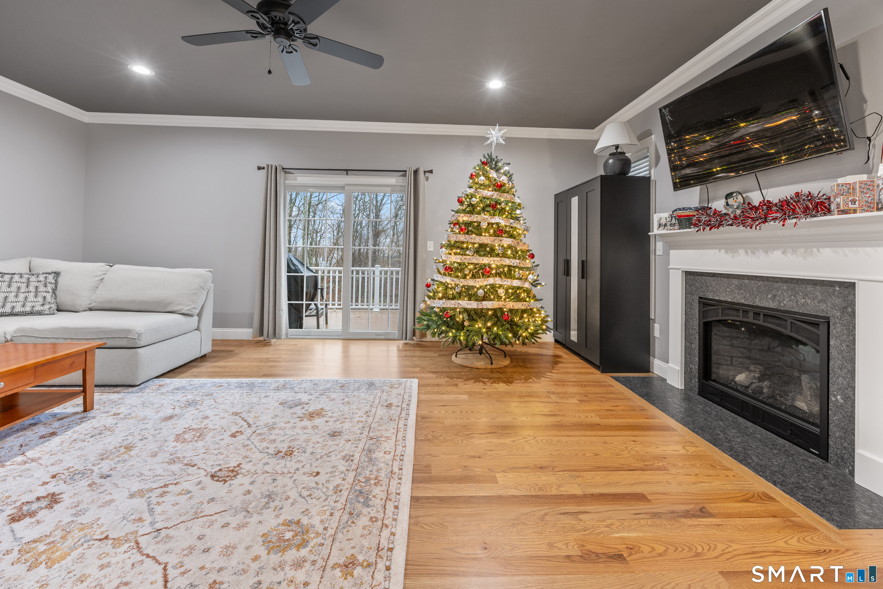 52 Brookview Circle, Unit 52 Bristol, CT 06010 - Photo 15 of 29 a living room with furniture and a fireplace