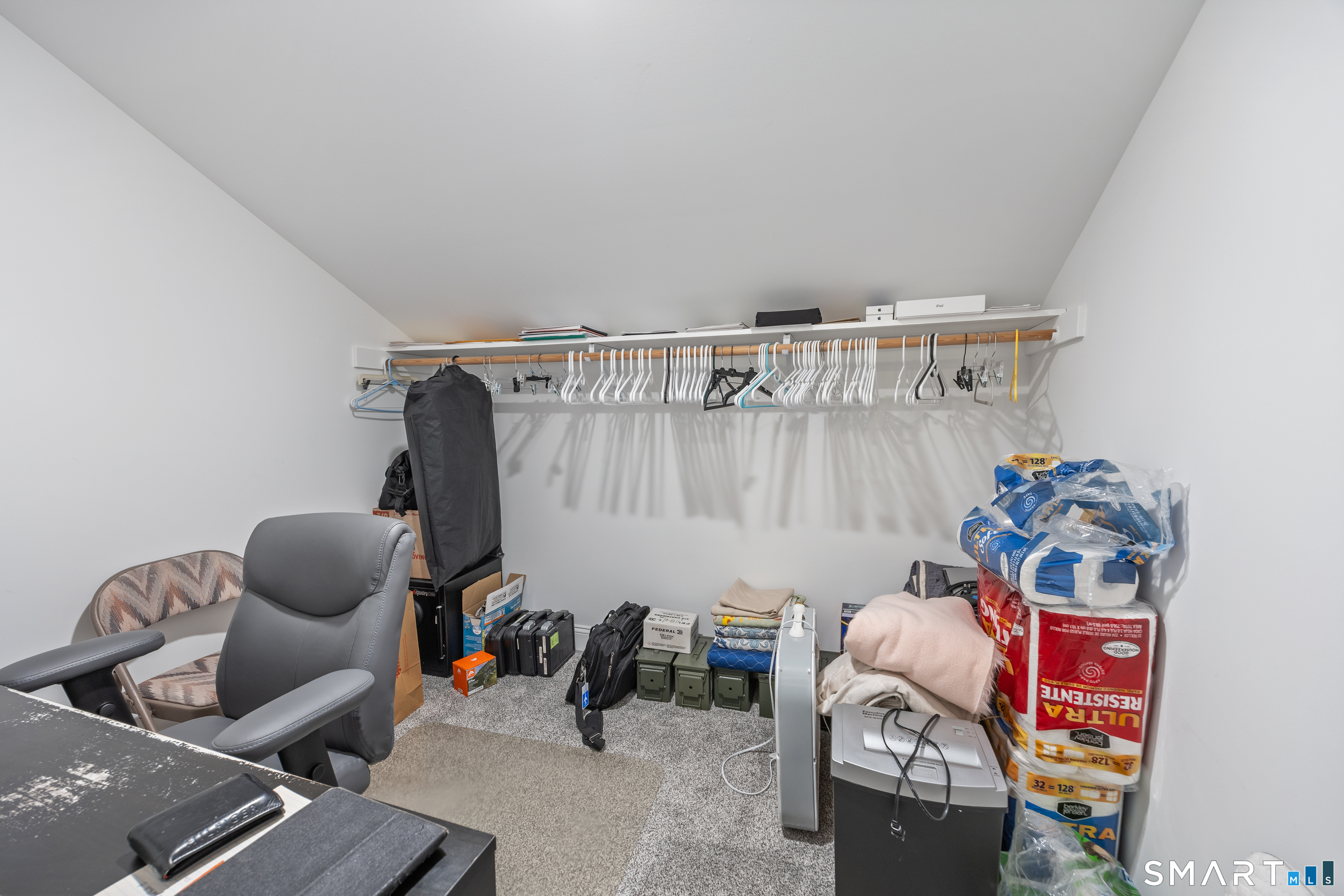 52 Brookview Circle, Unit 52 Bristol, CT 06010 - Photo 26 of 29 a bedroom with furniture and a couch