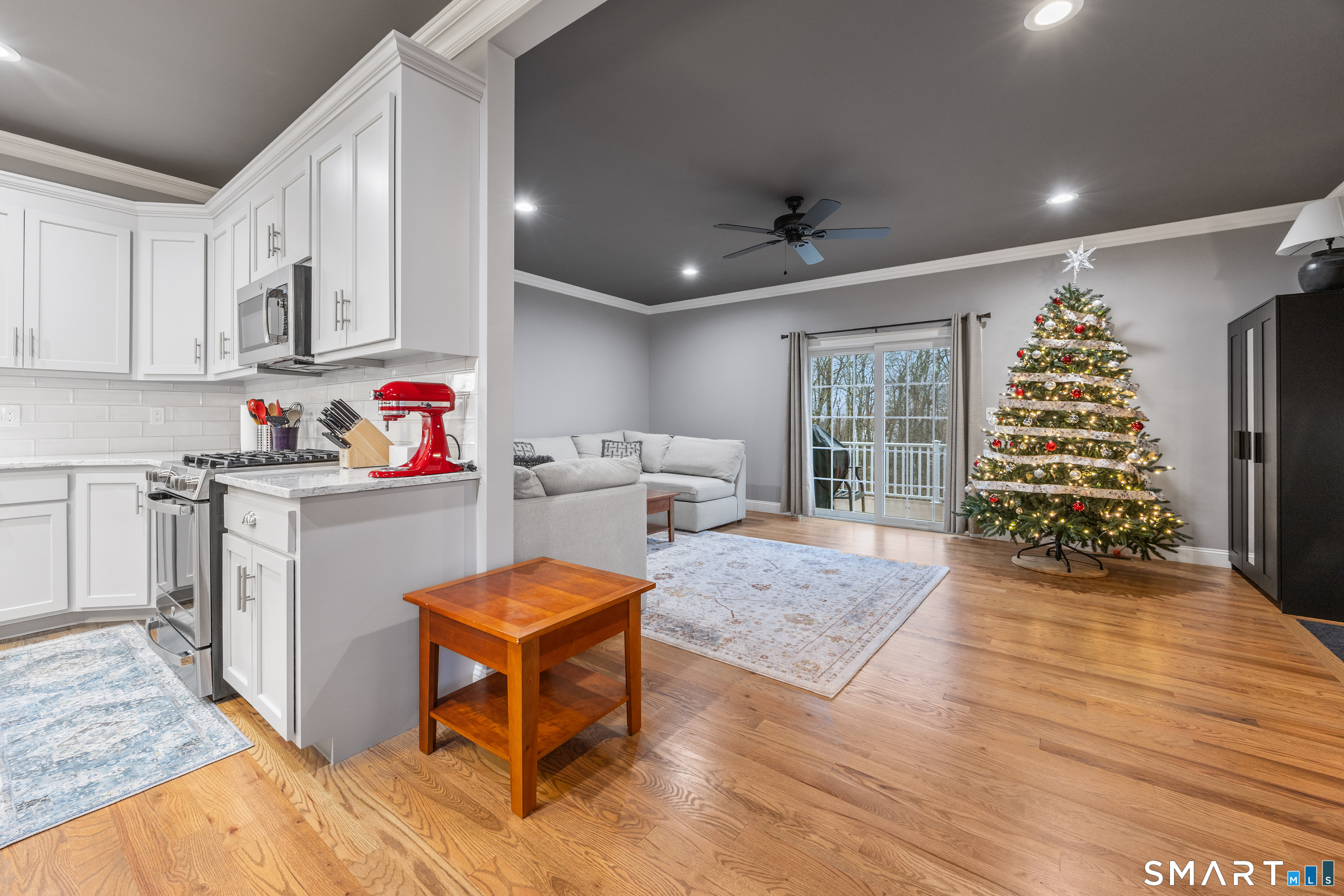 52 Brookview Circle, Unit 52 Bristol, CT 06010 - Photo 10 of 29 a living room with furniture and a fireplace