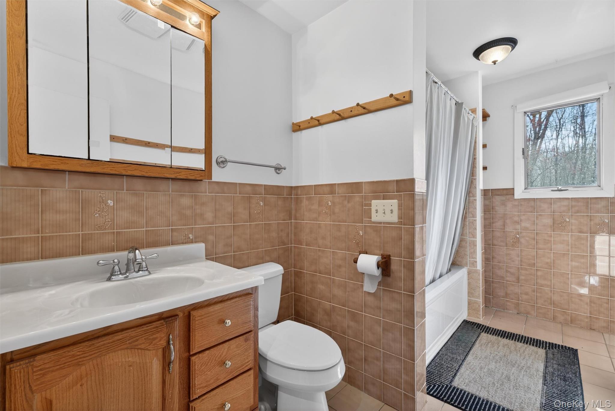 220 M And M Road Middletown, NY 10940 - Photo 20 of 45 Primary bathroom with a hallway door AND a door into primary bedroom