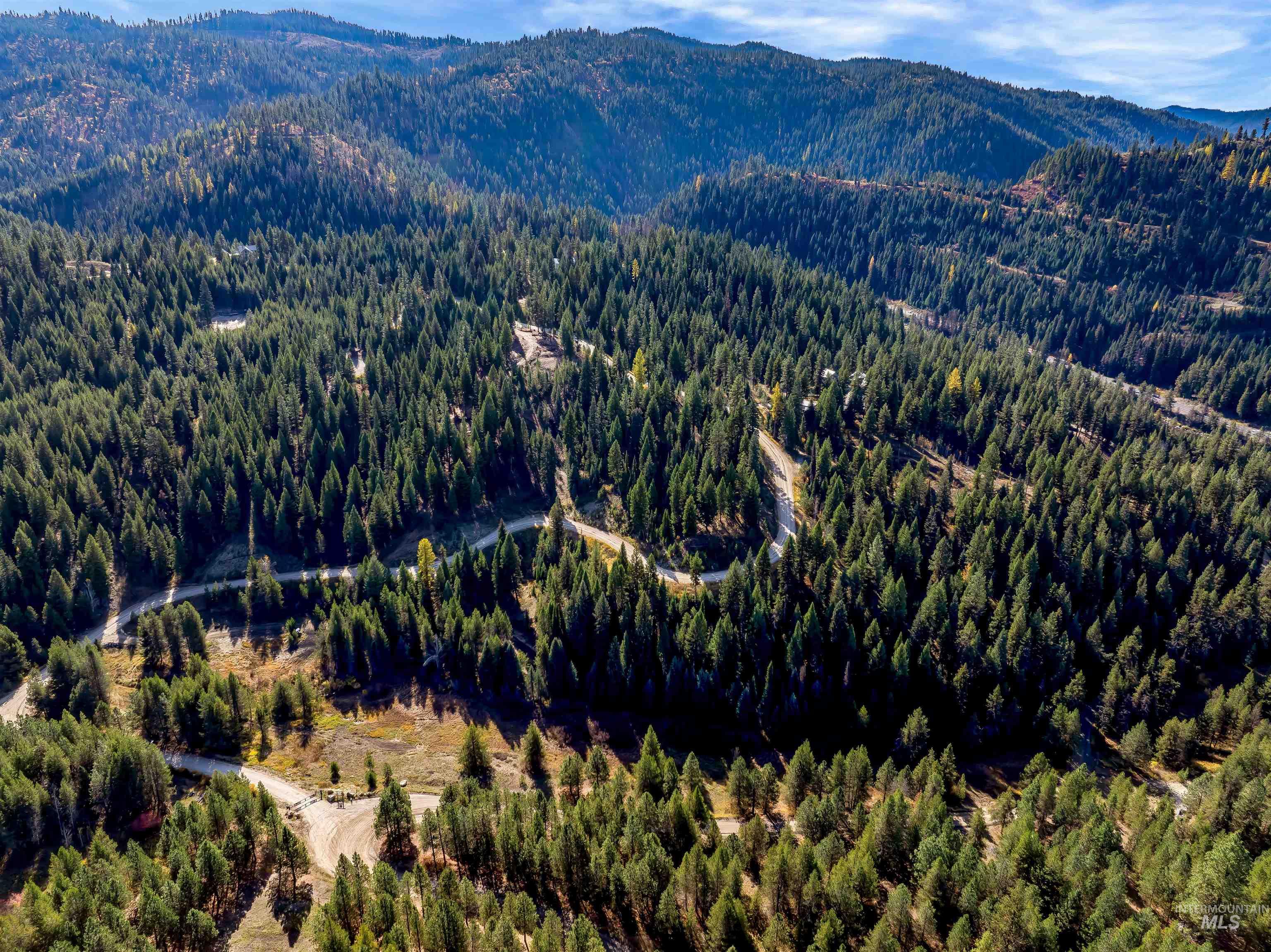 201 Tripod View Cascade, ID 83611 - Photo 13 of 41 Aerial view of property's location featuring mountains