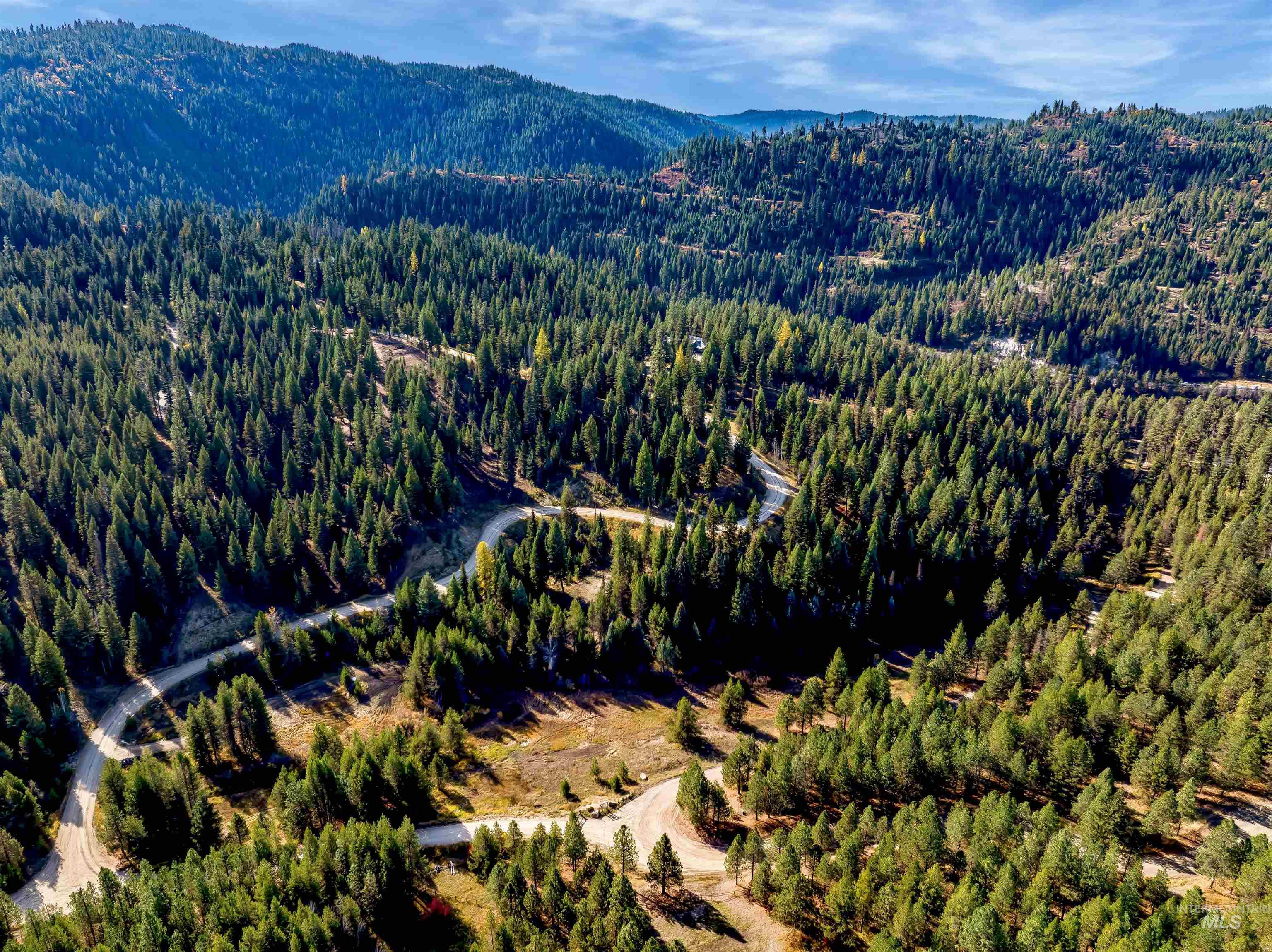 201 Tripod View Cascade, ID 83611 - Photo 31 of 41 Aerial view of mountains and a heavily wooded area