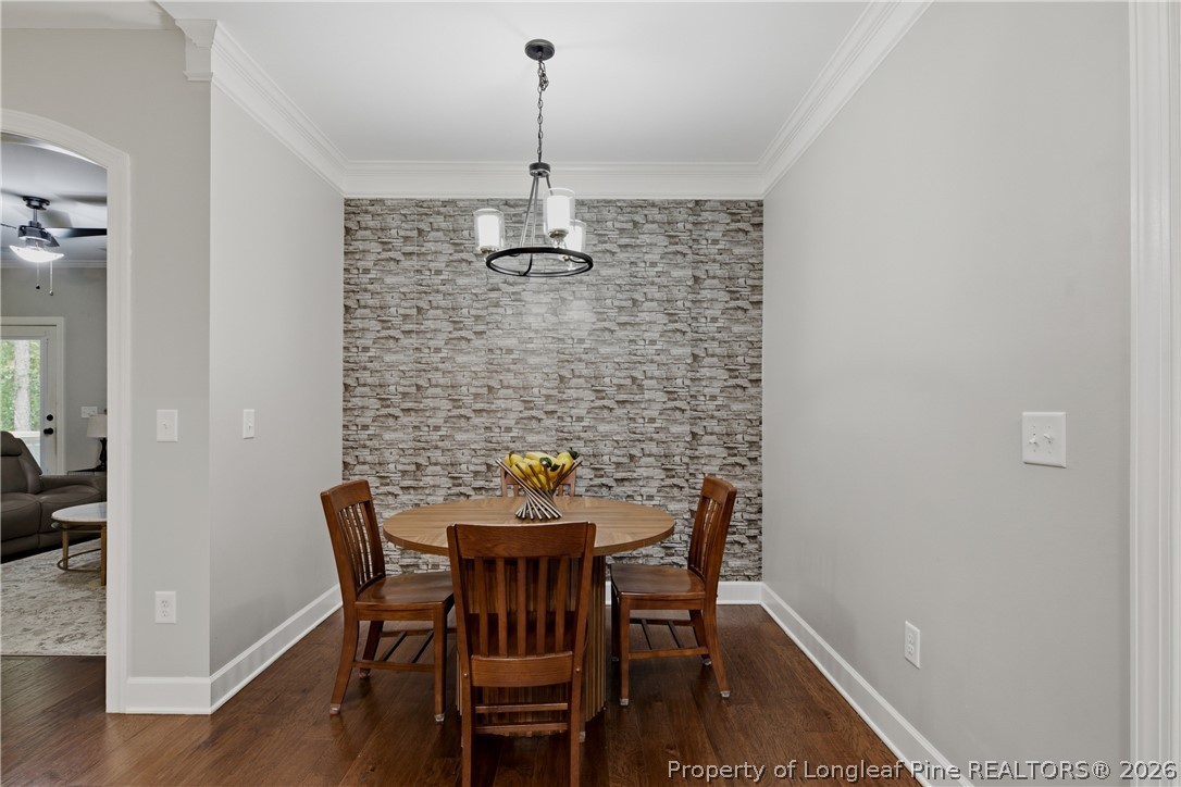 148 Heatherspring Way Spring Lake, NC 28390 - Photo 17 of 50 a view of a dining room with furniture