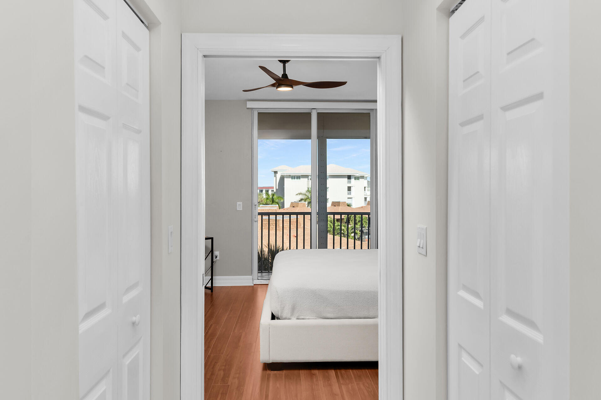 1111 Swallow Avenue, Unit 1401 Marco Island, FL 34145 - Photo 25 of 36 a view of a bedroom from a hallway
