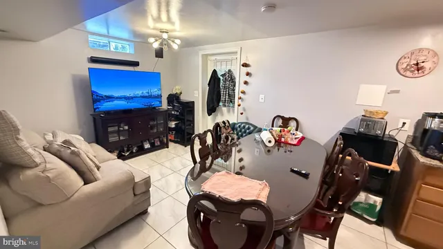 a room with toys and dresser