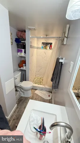 a view of storage and utility room