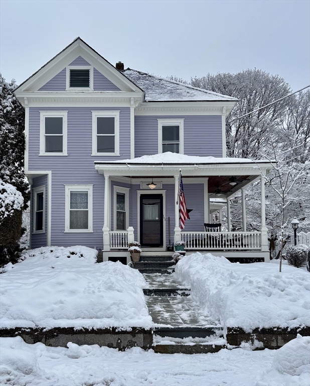 142 Sanders Avenue Lowell, MA 01851 - Photo 2 of 28 a front view of a house with a yard
