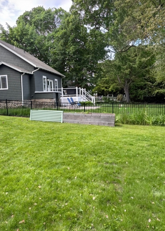 142 Sanders Avenue Lowell, MA 01851 - Photo 27 of 28 a front view of house with yard and green space