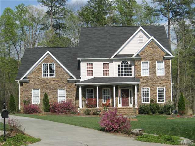 1008 Clark Ridge Court Raleigh, NC 27613 - Photo 1 of 15 Beautiful Stone-front home on quiet small cul-de-sac enjoys a 1.23 acre lot. Exterior Front