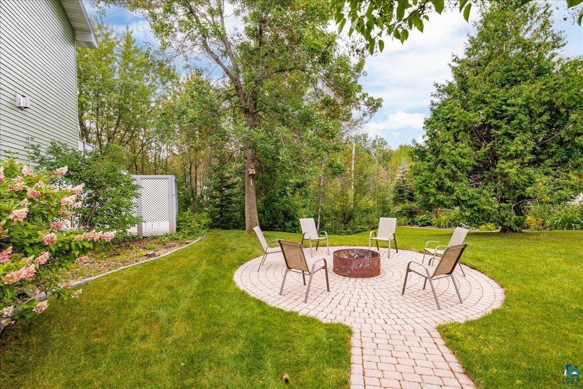 2524 Providence Road Duluth, MN 55811 - Photo 35 of 42 View of yard with a patio and a fire pit