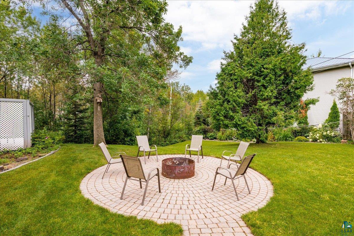 2524 Providence Road Duluth, MN 55811 - Photo 36 of 42 View of yard with a patio and a fire pit