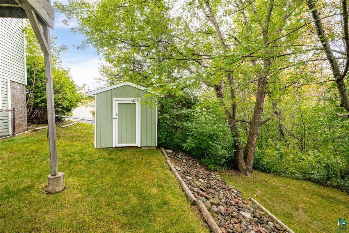 2524 Providence Road Duluth, MN 55811 - Photo 39 of 42 View of yard featuring a storage shed