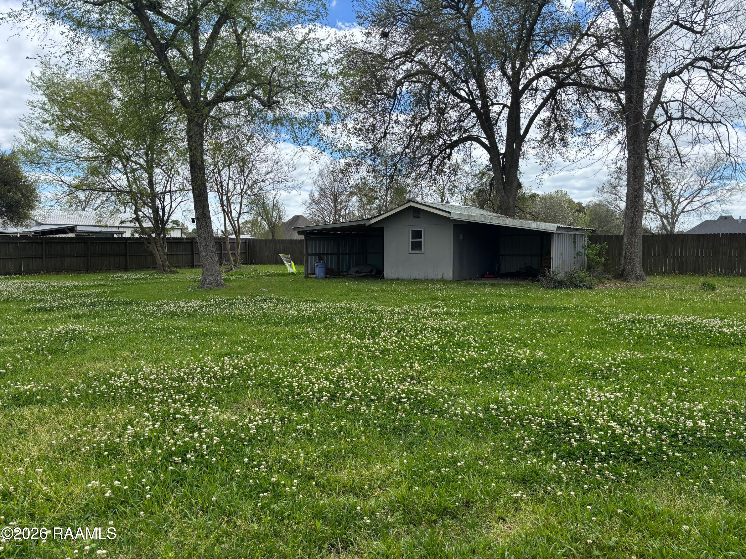 218 Fallis Road Lafayette, LA 70507 - Photo 2 of 28 Backyard building