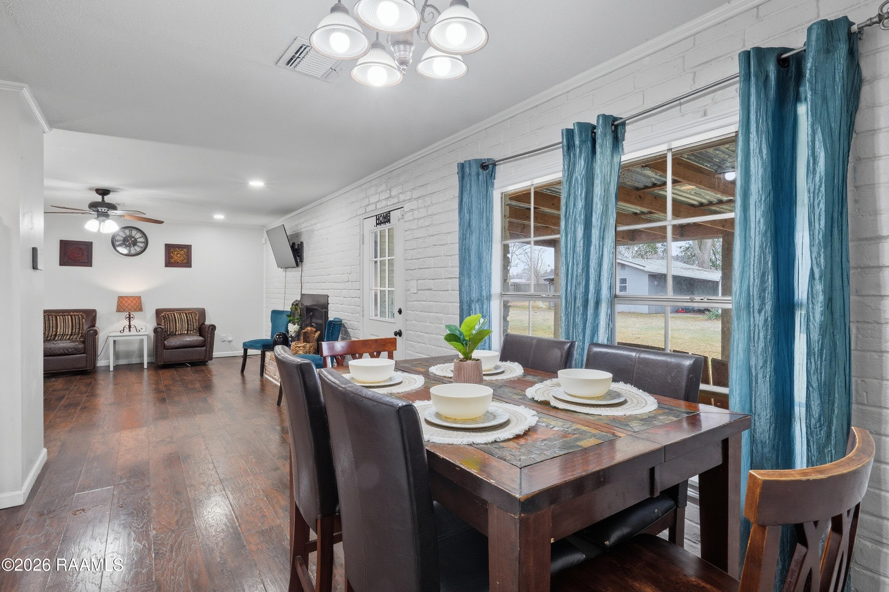 218 Fallis Road Lafayette, LA 70507 - Photo 9 of 28 Fallis breakfast room and living room