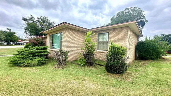 a swimming pool with wooden fence