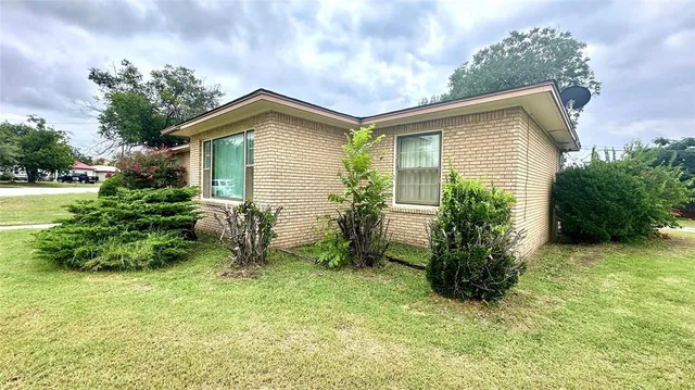 a swimming pool with wooden fence