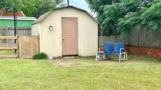 a view of a swimming pool with a garden