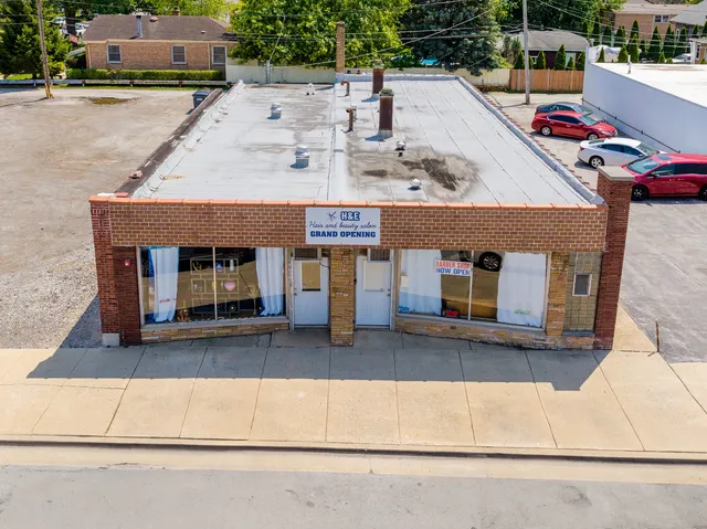 a view of building with cars