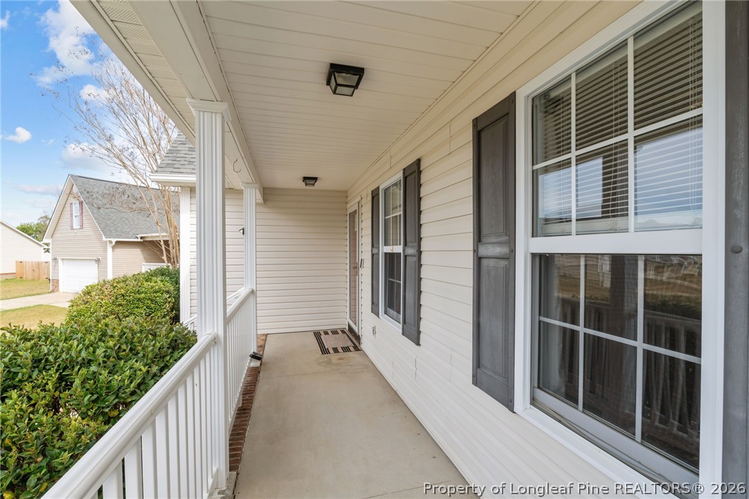 115 Shelby Street Spring Lake, NC 28390 - Photo 4 of 40 a balcony view with a outdoor space